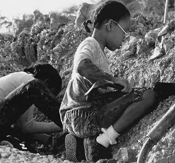 Local kids digging clay at the Stancills Mine, Maryland, 2005. 