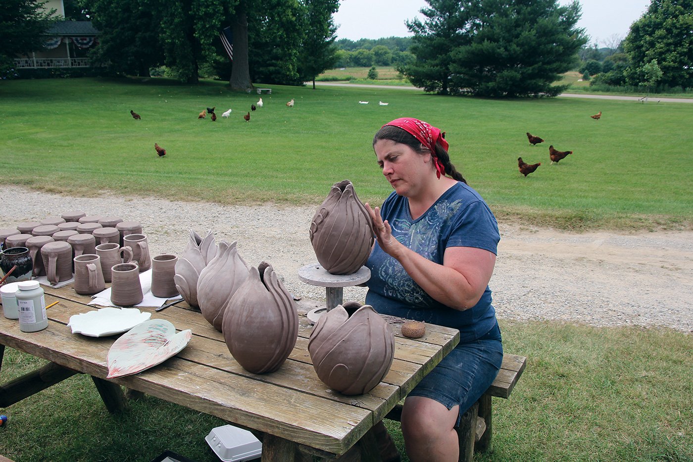 Dawn working on her tendril series outside her studio, her chickens in the yard behind her, July 2015. Photo by Robert Soltysiak. Dawn working on her tendril series outside her studio, her chickens in the yard behind her, July 2015. Photo by Robert Soltysiak.