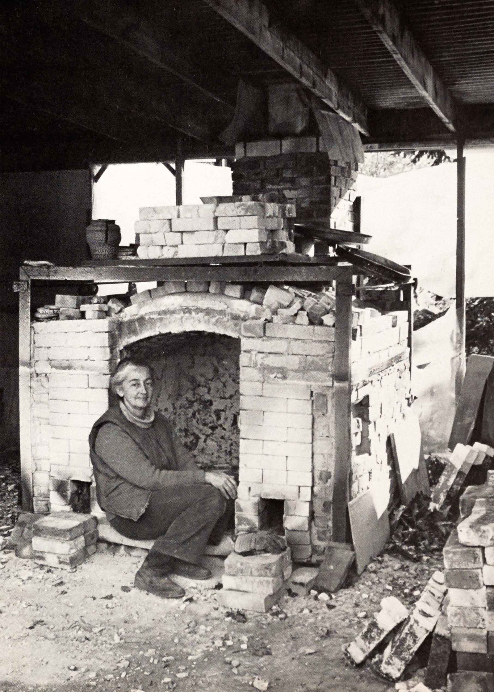 Karen Karnes in front of her salt kiln, 1976. From SP Vol. 5, No. 2. Karen Karnes in front of her salt kiln, 1976. From SP Vol. 5, No. 2.