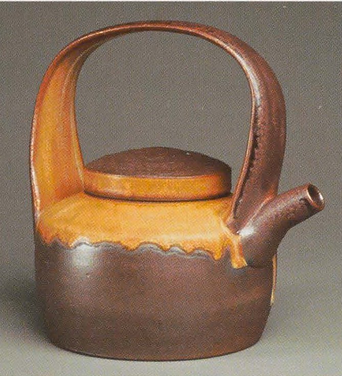 Teakettle/Teapot, 2007. Glaze and naked exterior with soda/wood surface, 9 x 6"x i2in