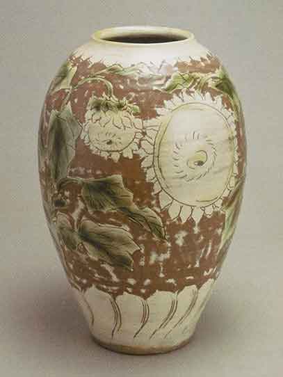 Jar with sgraffito design of sunflowers, 1947, Yagi Kazuo. Stoneware with white slip and clear and copper glazes. 12 x 8 in.