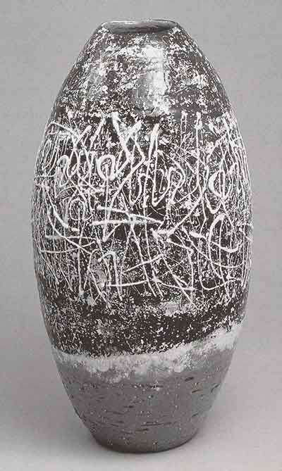 Rondo, 1950, Suzuki Osamu. Stoneware with white slip, black pigment and clear glaze. 17 x 7.75 in.