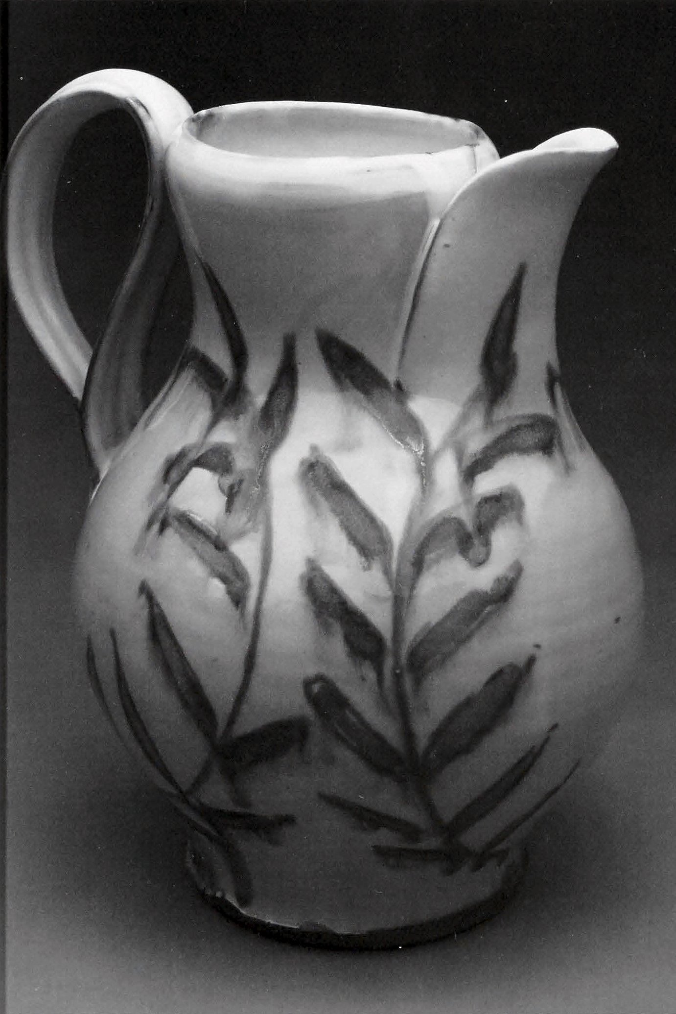 Blushing Leaf Pitcher, 2010. Earthenware, slip, glaze. 9 x 5 x 5 in. Blushing Leaf Pitcher, 2010. Earthenware, slip, glaze. 9 x 5 x 5 in.