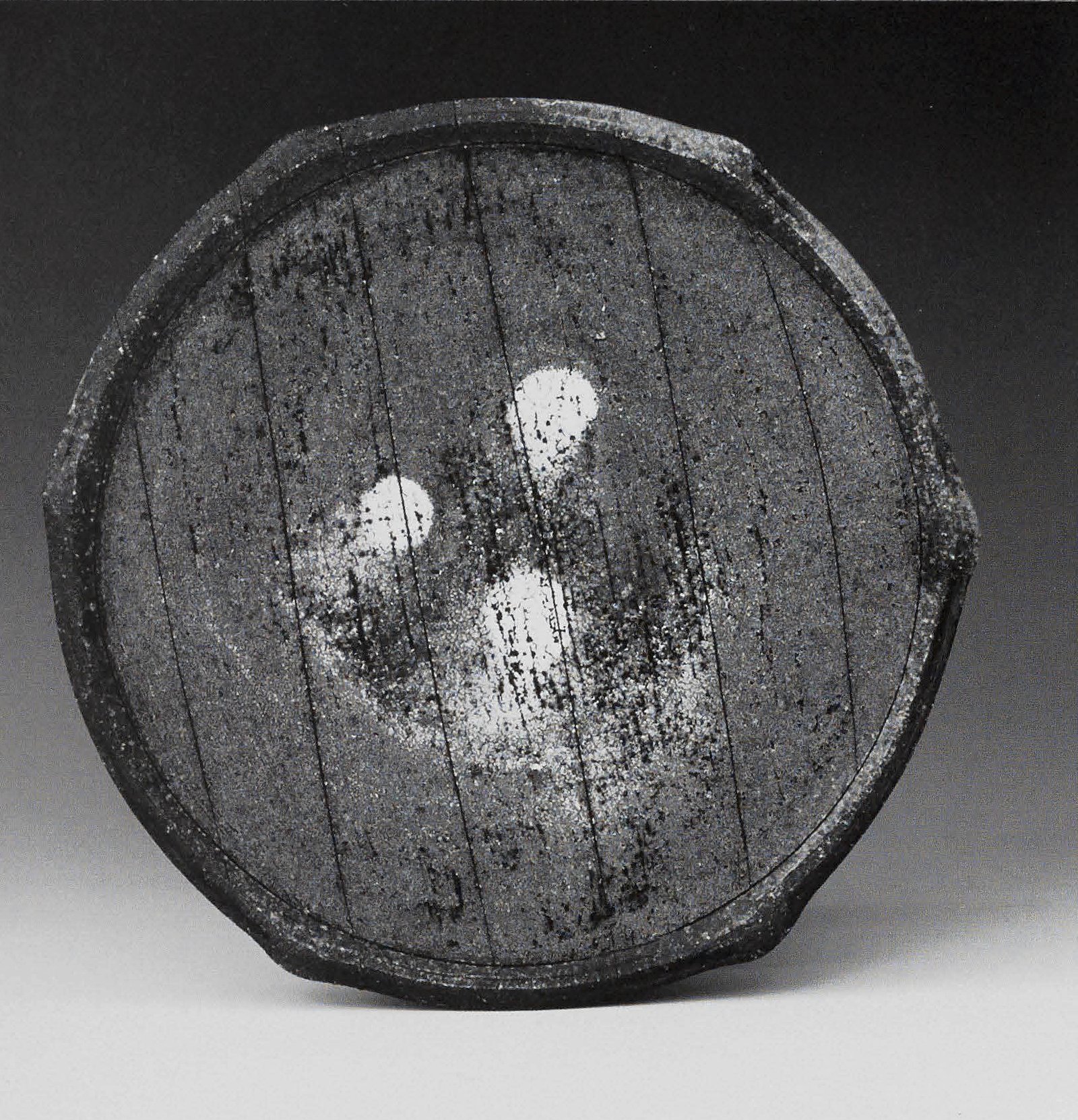 Striped plate, 10'dia. Woodfired stoneware, 2008