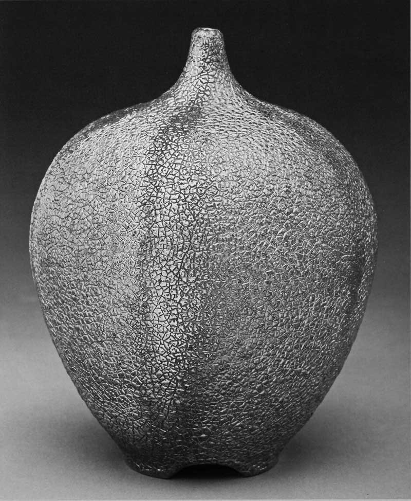 James C. Watkins. Bottle Form, 2013. Saggar-fired with Cone 04 glaze, fumed gold luster, 16 x 14 in. Photograph by Jon Thompson. James C. Watkins. Bottle Form, 2013. Saggar-fired with Cone 04 glaze, fumed gold luster, 16 x 14 in. Photograph by Jon Thompson.