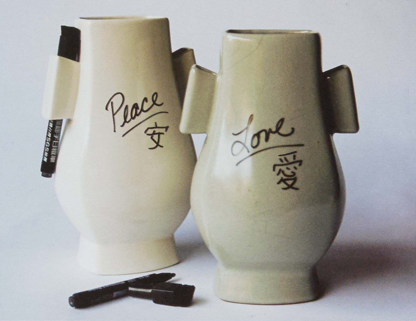 Ears Vase, 2012. Stoneware, slip-cast 9.5 x 6 x 5 in. Based on an historic Guanware Chinese vase. Originally, the "ears" of the vase were meant for a carrying rope, but I replaced the rope with dry-erase markers introducing and interactive element to the Ears Vase, 2012. Stoneware, slip-cast 9.5 x 6 x 5 in. Based on an historic Guanware Chinese vase. Originally, the "ears" of the vase were meant for a carrying rope, but I replaced the rope with dry-erase markers introducing and interactive element to the