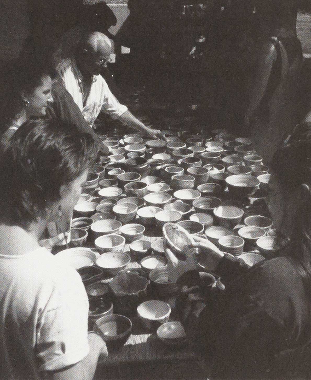 Paulus Berensohn and students with Empty Bowl pots.