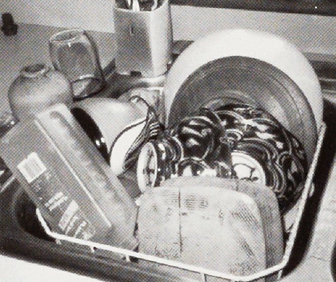 Dishes in dish rack. Dishes in dish rack.