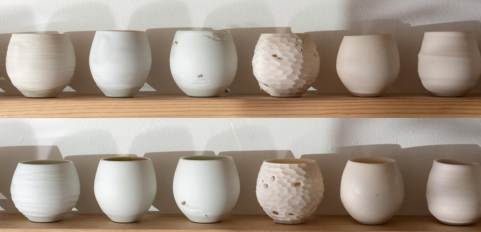 Details of cups from 365 piece installation “A Year and A Day” in the gallery. Image courtesy of Ty and Chey.
