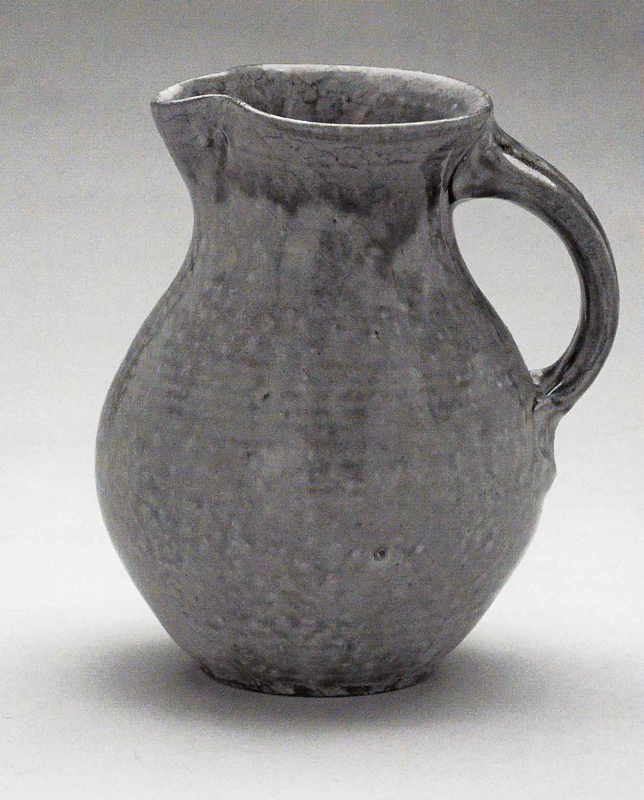 Jug, March 2005. Cone 10 woodfired stoneware, ash glaze over porcelain slip. H 7.5" x W 6". Photograph by VanZandenbergen.
