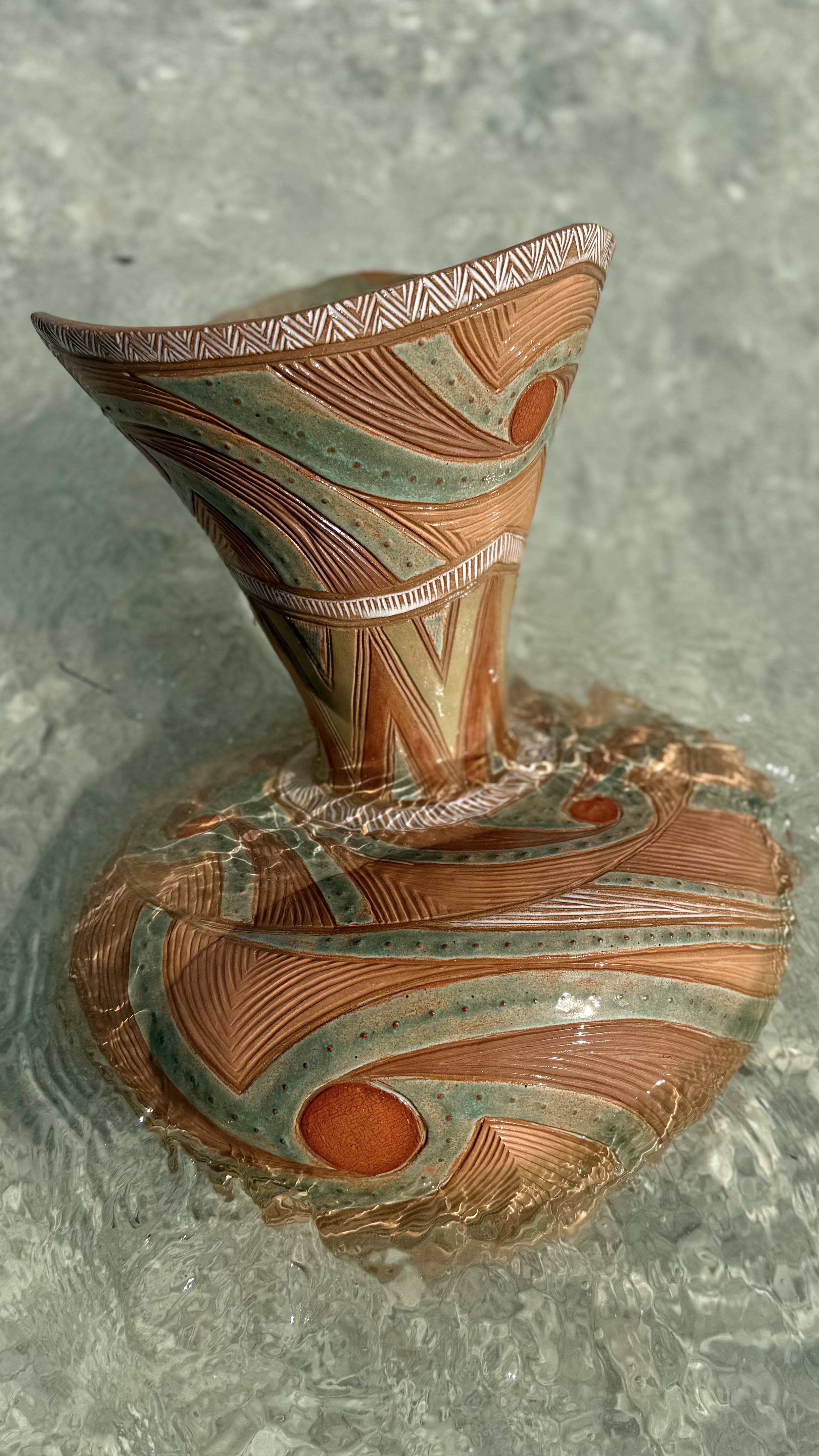 Hurricane Vase. Decorated with clays from Florida, Louisiana, Alabama, and New Mexico.