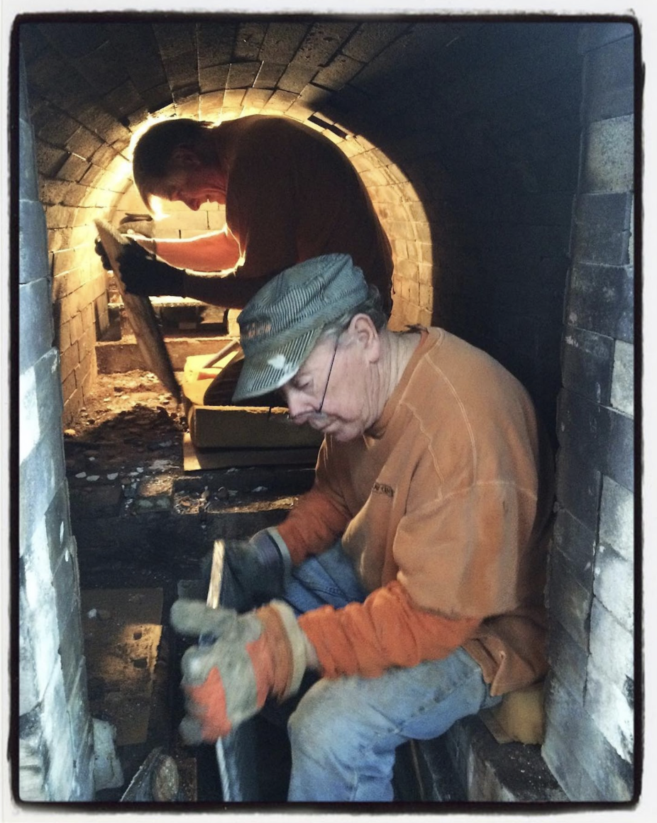 Stephen Driver and Ron Meyers unloading kiln.