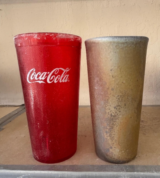 Coca-Cola cup next to Pilsner Tumbler Coca-Cola cup next to Pilsner Tumbler
