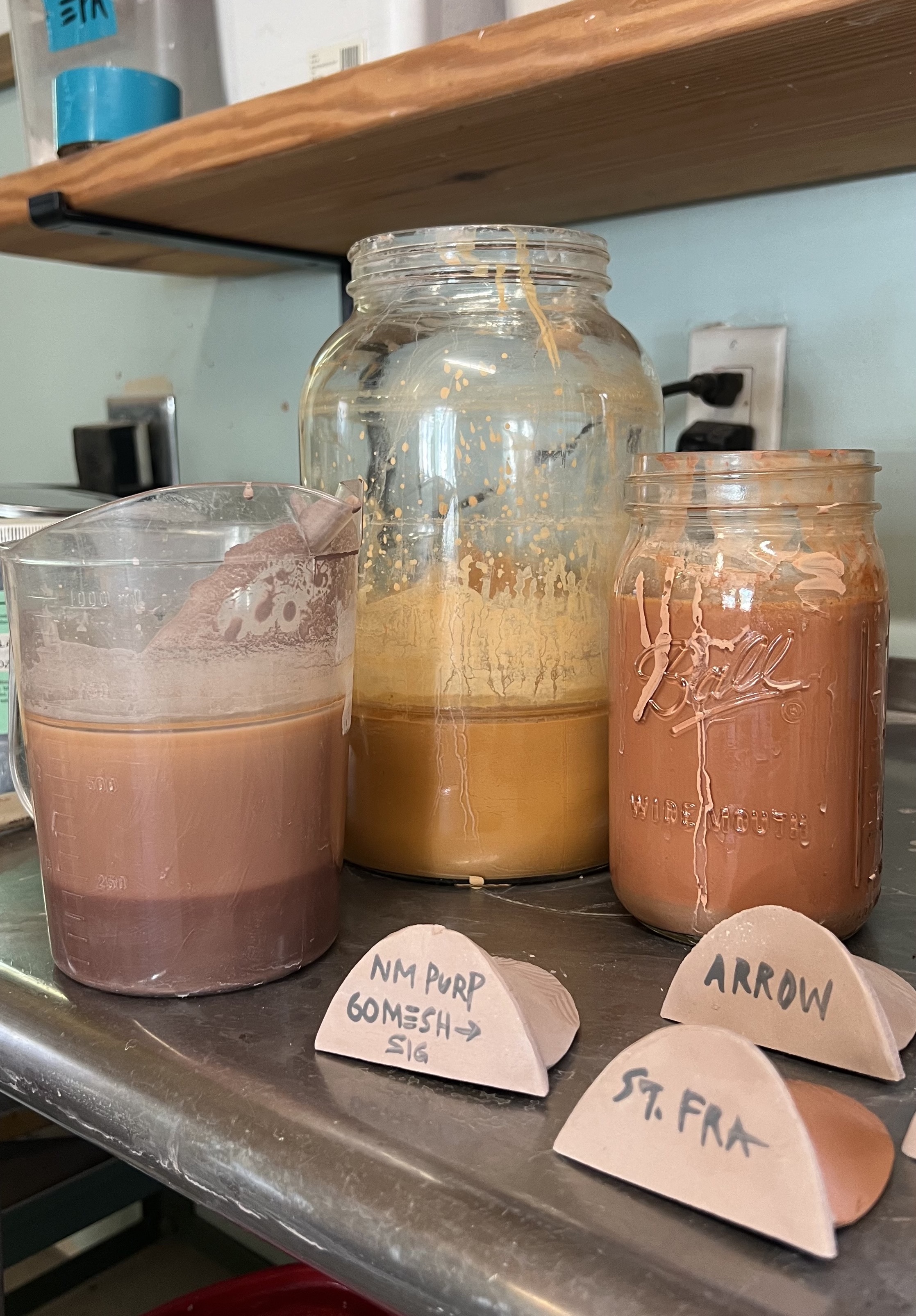 Sig Jars. Examples of the different ways layers form in deflocculated wild clay solutions. New Mexico, Tennessee, and Louisiana (L to R).