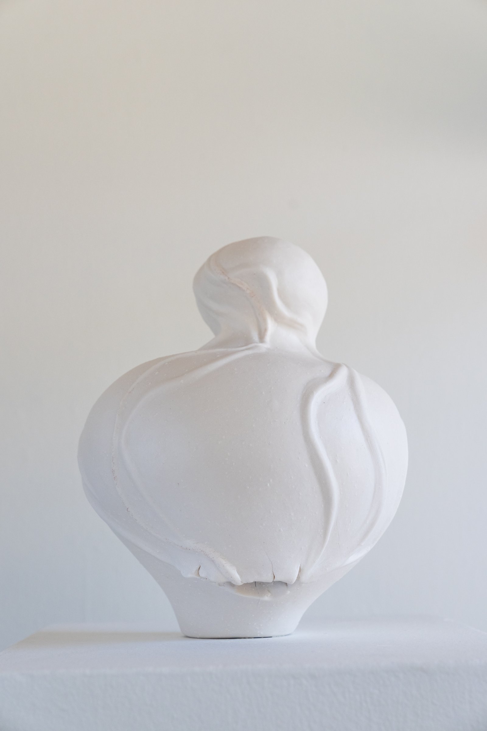 Venus, A Self Portrait” sculpted, cone 6, porcelain vessel with menstrual blood included in a singular vein flowing on the piece, in process coming out of glaze firing. Photo courtesy of Ty and Chey. Venus, A Self Portrait” sculpted, cone 6, porcelain vessel with menstrual blood included in a singular vein flowing on the piece, in process coming out of glaze firing. Photo courtesy of Ty and Chey.