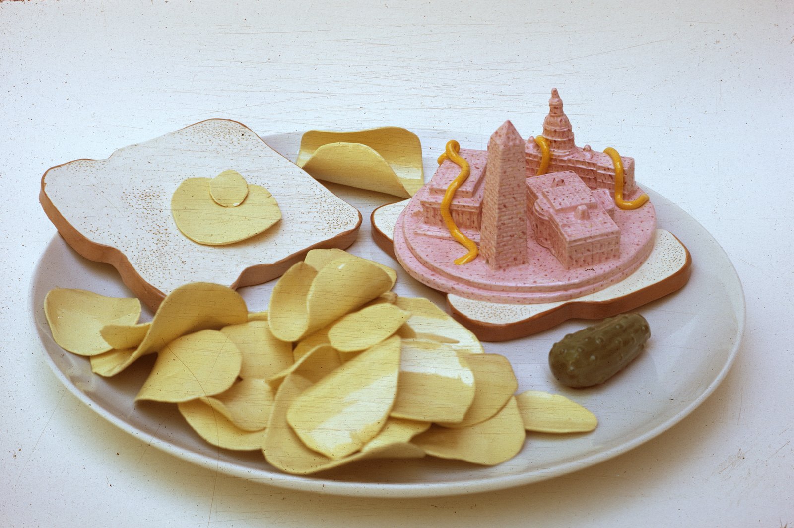 Washington Baloney, 1970, ceramic, glaze 3 x 12 x 12. Photo courtesy of Richard Notkin.
